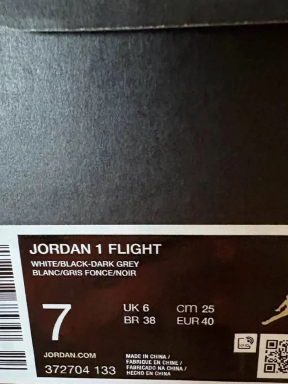 Jordan Men’s White and Black High-Top Sneakers